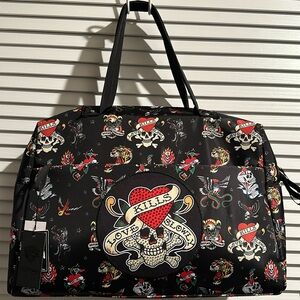 NWT Ed Hardy Weekend Traveler with Convenient Suitcase Slide and zipper closure.